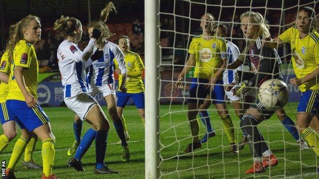 Ellie Brazil (third from left) scores a goal for Brighton against Birmingham City