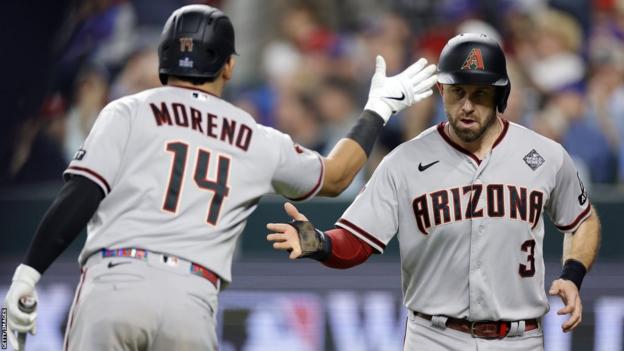 Arizona Diamondbacks' Gabriel Moreno and Evan Longoria