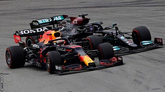 Max Verstappen and Lewis Hamilton on the racetrack at the Spanish Grand Prix