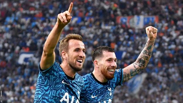 Tottenham's Pierre-Emile Hojbjerg celebrates scoring with Harry Kane against Marseille in the 2022 Champions League group stage