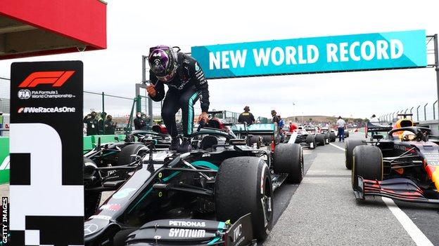 Lewis Hamilton celebrates winning Portuguese Grand Prix