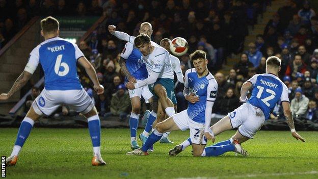 Manchester City's Jack Grealish has an attempt against Peterborough United in the FA Cup
