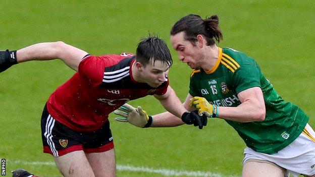 Meath's Cillian O'Sullivan (right) scored two goals to crush Down's hopes of a victory
