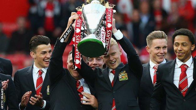James Weir lifts the U21 Premier League trophy in 2017