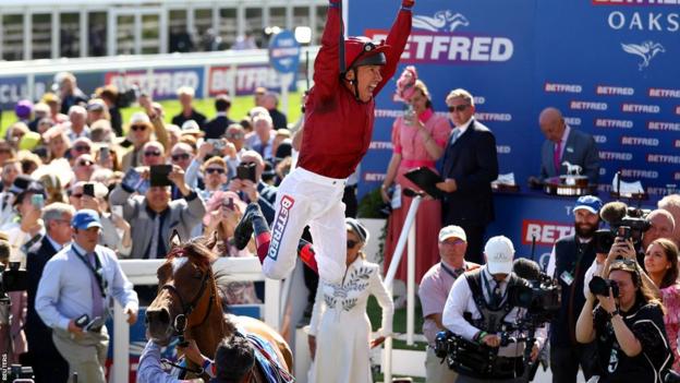 Frankie Dettori leaps off Soul Sister as he celebrates winning the Oaks at Epsom in 2023