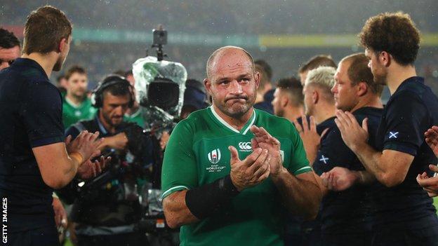Rory Best is applauded off the field by All Blacks players after Ireland's World Cup quarter-final defeat