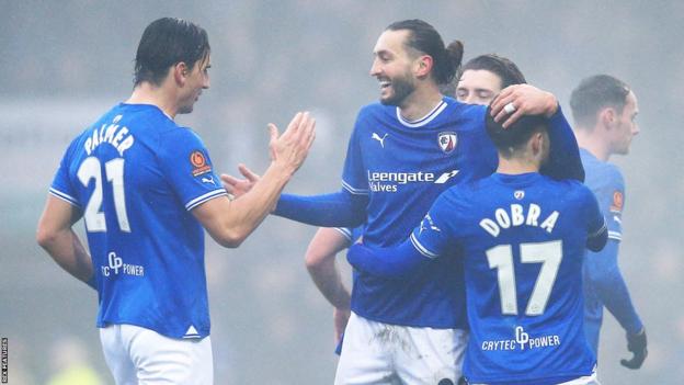 Chesterfield celebrate Brandon Cooper's own goal