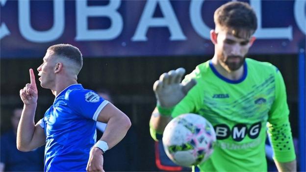 Ethan McGee celebrates scoring Dungannon's opener in Tuesday night's second leg