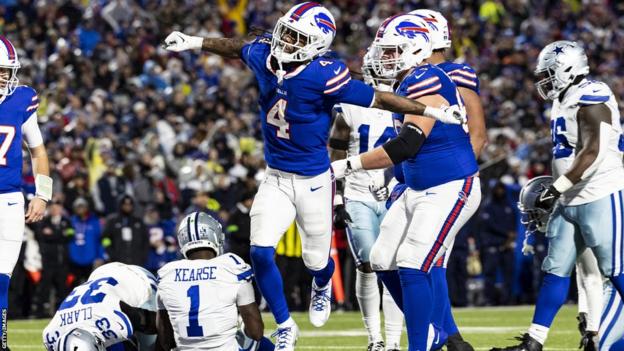 Buffalo Bills running back James Cook celebrates a touchdown