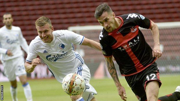 Christoffer Remmer and Declan Caddell vie for possession during the second leg