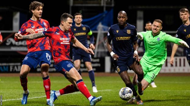 Rangers' Ryan Jack scores to make it 1-0 during a Premiership match between Dundee FC and Rangers at The Scot Foam Stadium at Dens Park