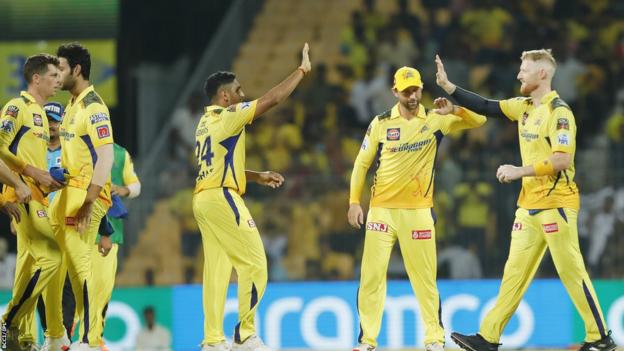 England Test skipper  Ben Stokes (right) celebrates taking a drawback  with Chennai Super Kings team-mates