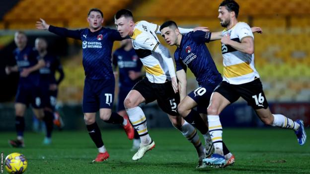 Kacper Lopata (number 5) impressed on his debut for Port Vale