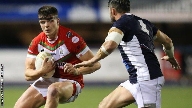 Wales' Rhodri Lloyd in action against France