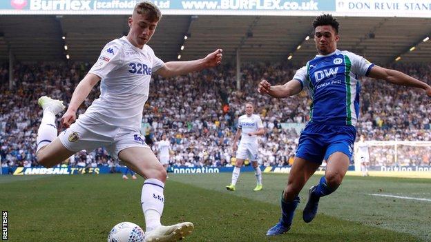 Jack Clarke (left) in action for Leeds United