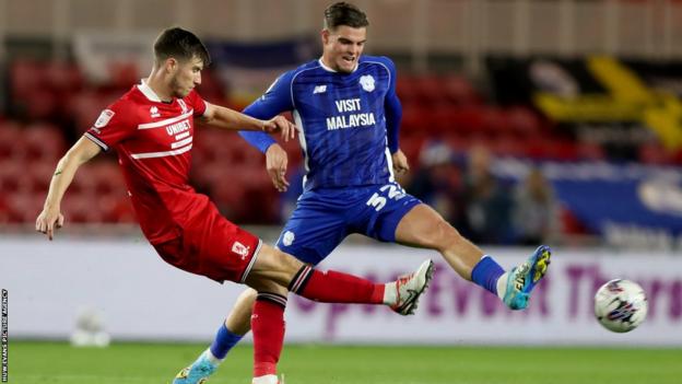 Paddy McNair of Middlesbrough and Ollie Tanner of Cardiff City
