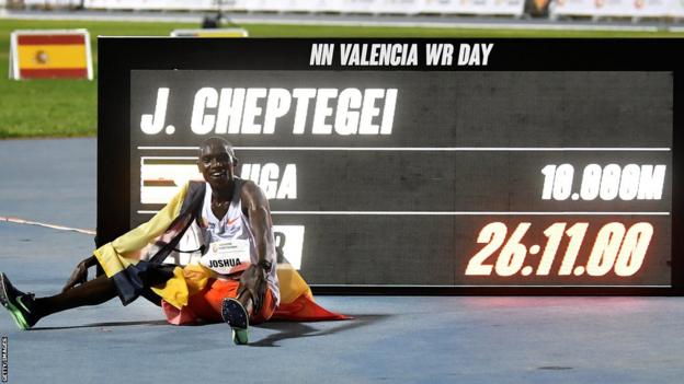 Ugandan athlete Joshua Cheptegei celebrates after breaking the 10,000m record in Valencia in October 2020