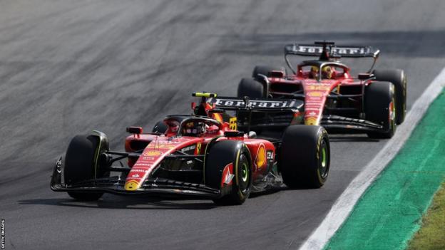 The Ferraris of Carlos Sainz and Charles Leclerc battle for position