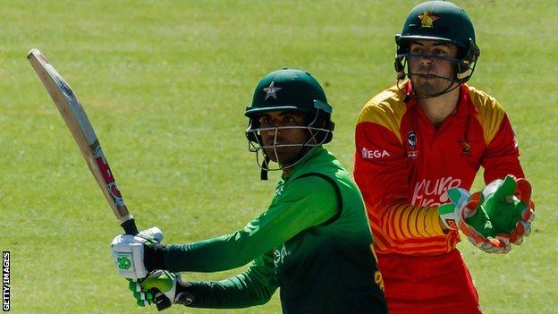 Pakistan's Fakhar Zaman and Zimbabwe wicketkeeper Ryan Murray