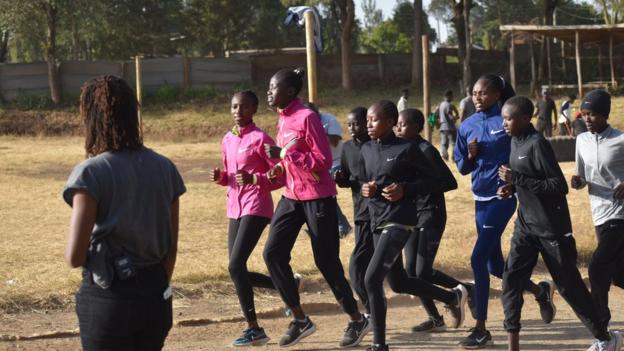 Marathon runner Mary Ngugi coaching girls at Nala Club, a structure she created to help young girls to develop their athletics abilities in a safe environment.