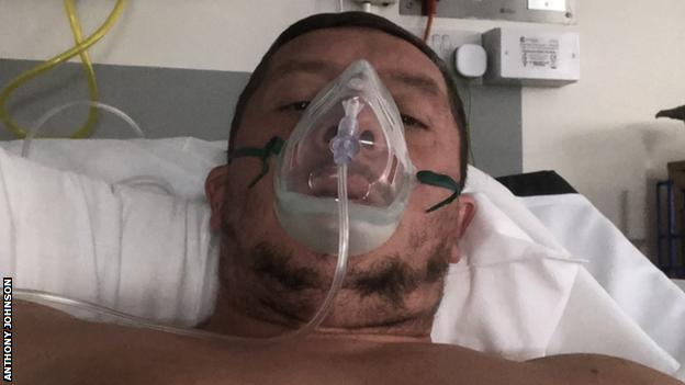 Chester joint manager Anthony Johnson wearing an oxygen mask at Fairfield General Hospital, Bury, Greater Manchester