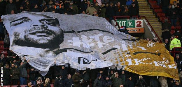 A Carl Ikeme banner in the crowd at Molineux