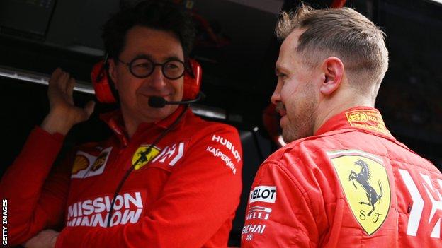 Ferrari team boss Mattia Binotto and Sebastian Vettel