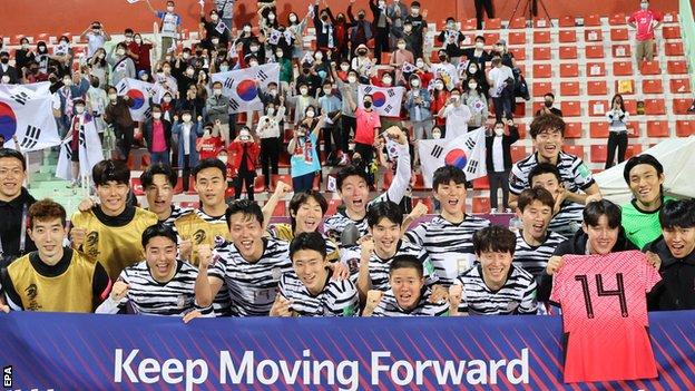 South Korea celebrate after the win over Syria
