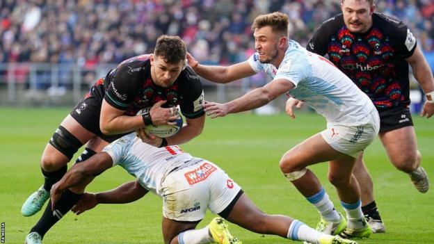 Bristol Bears' Magnus Bradbury (left) is tackled by Vodacom Bulls' Sergeal Petersen