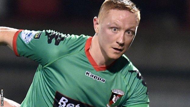 Sport & Leisure's former Glentoran midfielder Stephen McAlorum is believed to have lost a tooth in the incident