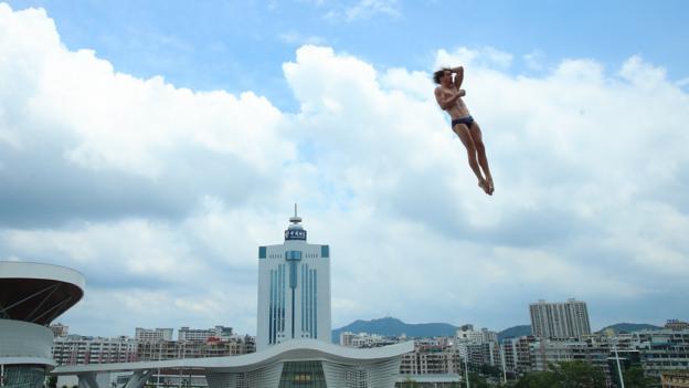 Zhaoqing, China, 26 May: Gary Hunt of Great Britain competes in the Men's 27m high diving final round on day two of the FINA High Diving World Cup at Zhaoqing High Diving Training Centre. (Photo by Lintao Zhang/Getty Images)