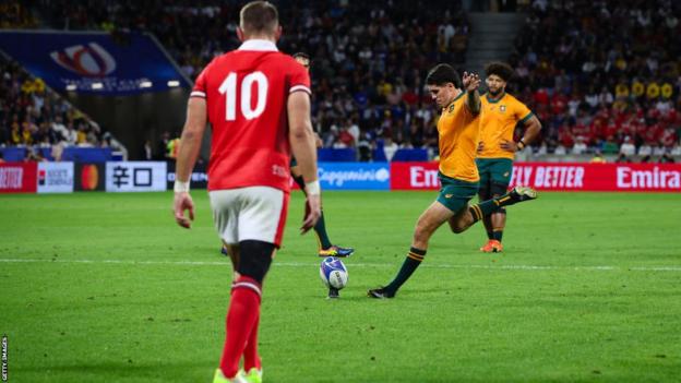 Ben Donaldson kicks for goal against Wales