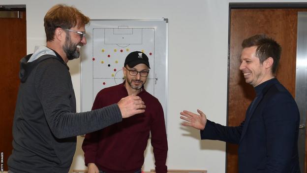 Liverpool manager Jurgen Klopp (left) with sporting director Michael Edwards (right) and Fenway Sports Group president Mike Gordon