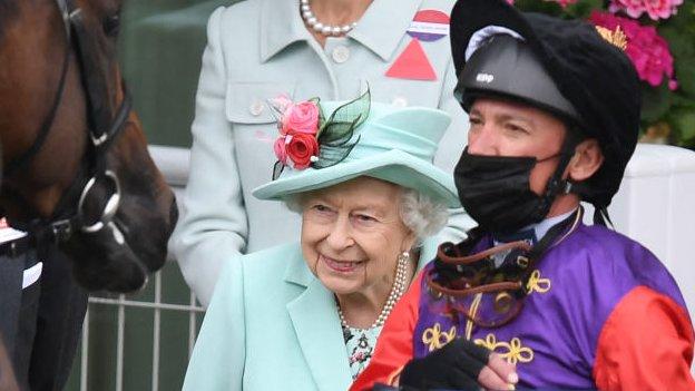 The Queen with jockey Frankie Dettori