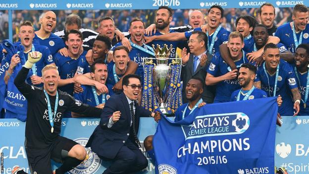 Leicester players with the Premier League trophy