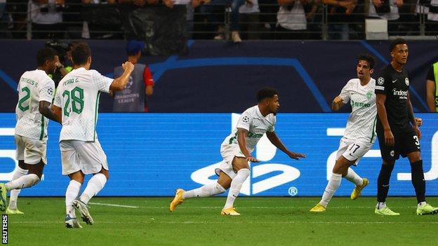 Marcus Edwards (center) celebrates scoring for Sporting Lisbon in the Champions League