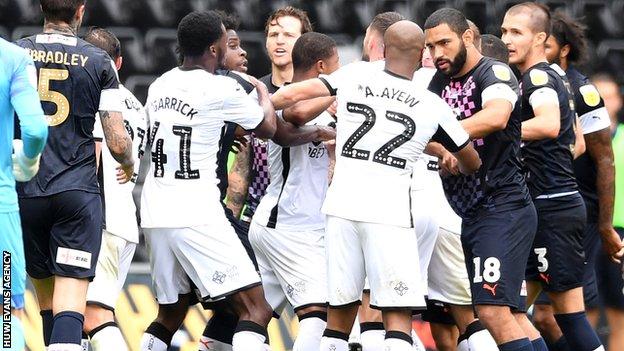 Tempers flare at Liberty Stadium
