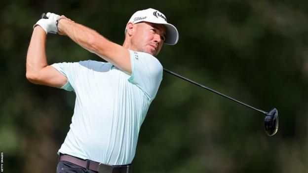 Brian Harman plays a shot