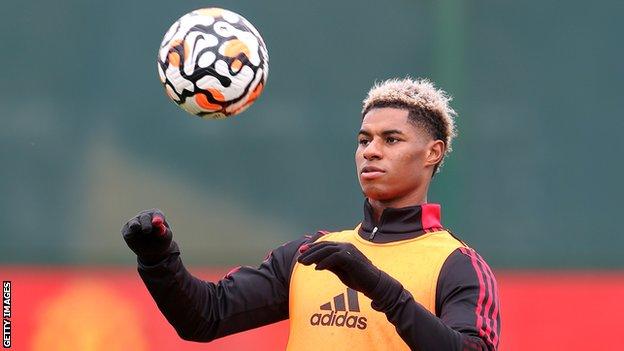 Rashford back in training with United