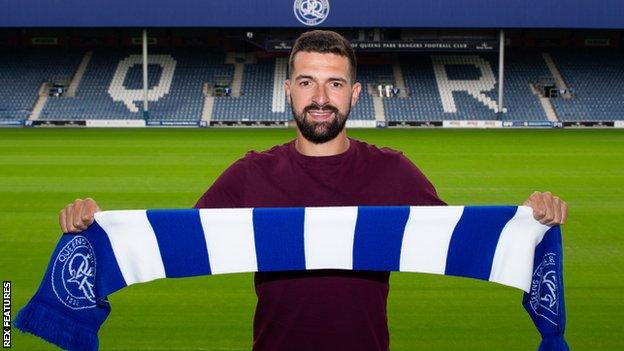 New QPR signing Yoann Barbet poses for pictures at Loftus Road