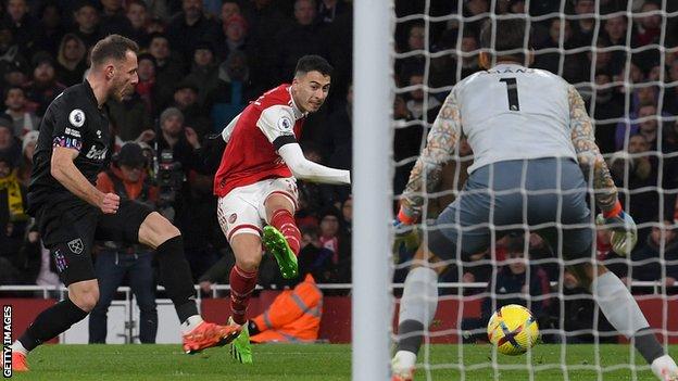 Gabriel Martinelli scores Arsenal's second goal against West Ham