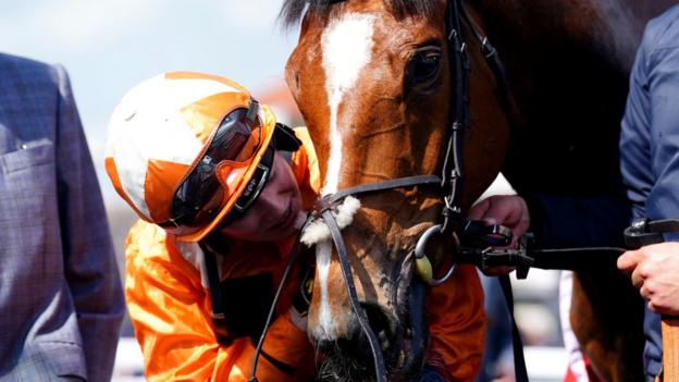 Saffie Osborne celebrates with Metier after winning the Chester Cup