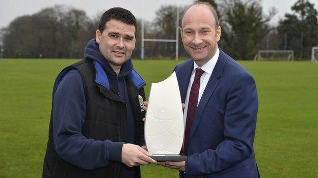 David Healy receives the December award from Northern Ireland Football Writers chairman Stephen Watson