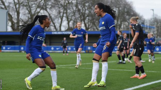 Chelsea players celebrate scoring against Crystal Palace in the Women's FA Cup