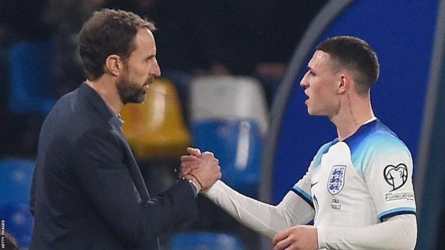 England manager Gareth Southgate and attacking midfielder Phil Foden