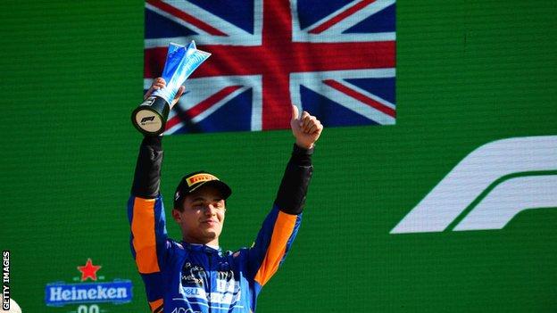 Lando Norris celebrates finishing second in Italy last year