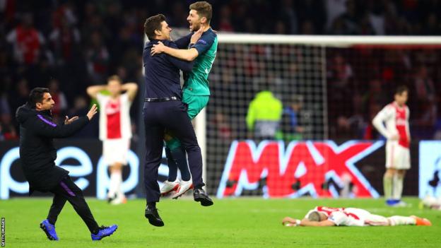 Mauricio Pochettino and Ben Davies celebrate Spurs' dramatic Champions League semi-final win at Ajax in 2019
