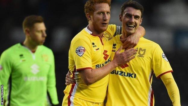 MK Dons celebrate scoring against Derby
