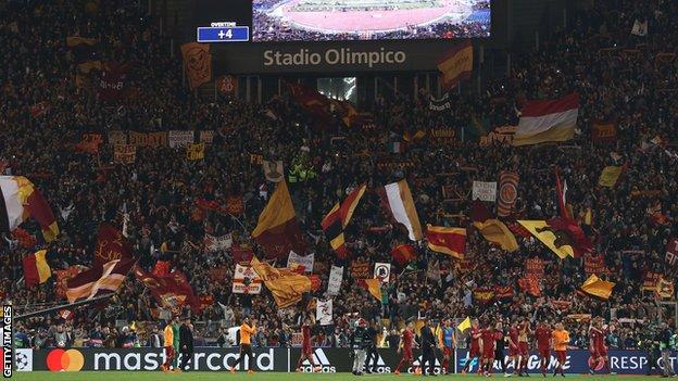 Roma's fans celebrate beating Barcelona in the Champions League quarter-final
