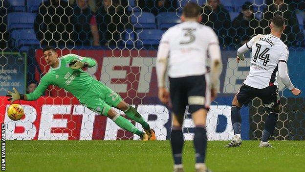 Gary Madine fires the ball past Cardiff goalkeeper Neil Etheridge - diving to his right - from the penalty spot